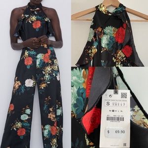 Zara black floral jumpsuit with side cutouts
